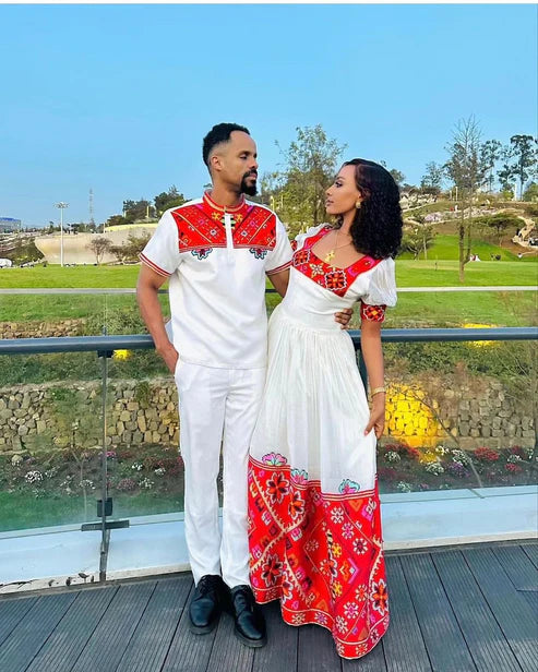 Passionate Red Bliss: Vibrant Habesha Couples Outfit in Menen Fabric.