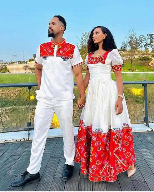 Passionate Red Bliss: Vibrant Habesha Couples Outfit in Menen Fabric.