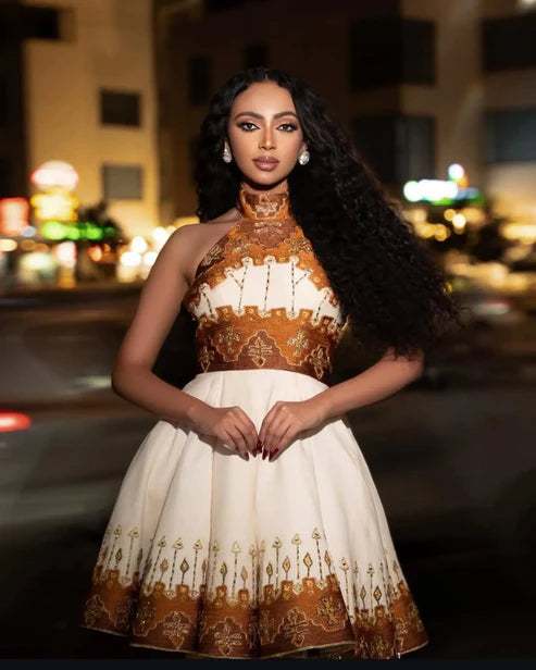 Graceful Simplicity in Golden Habesha Dress