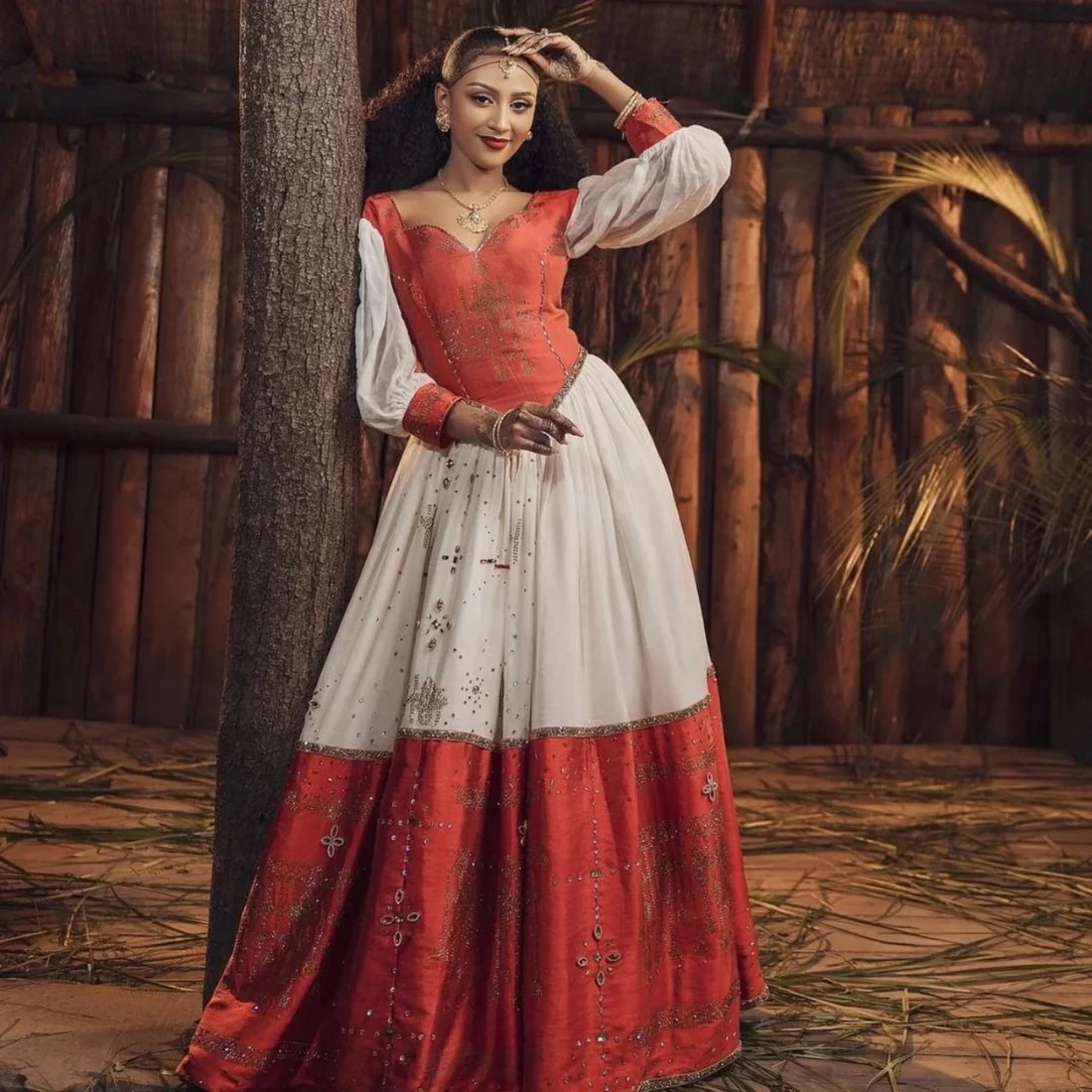 Magnificent Red Habesha Dress: Featuring a Corset Design and Gold Detailing