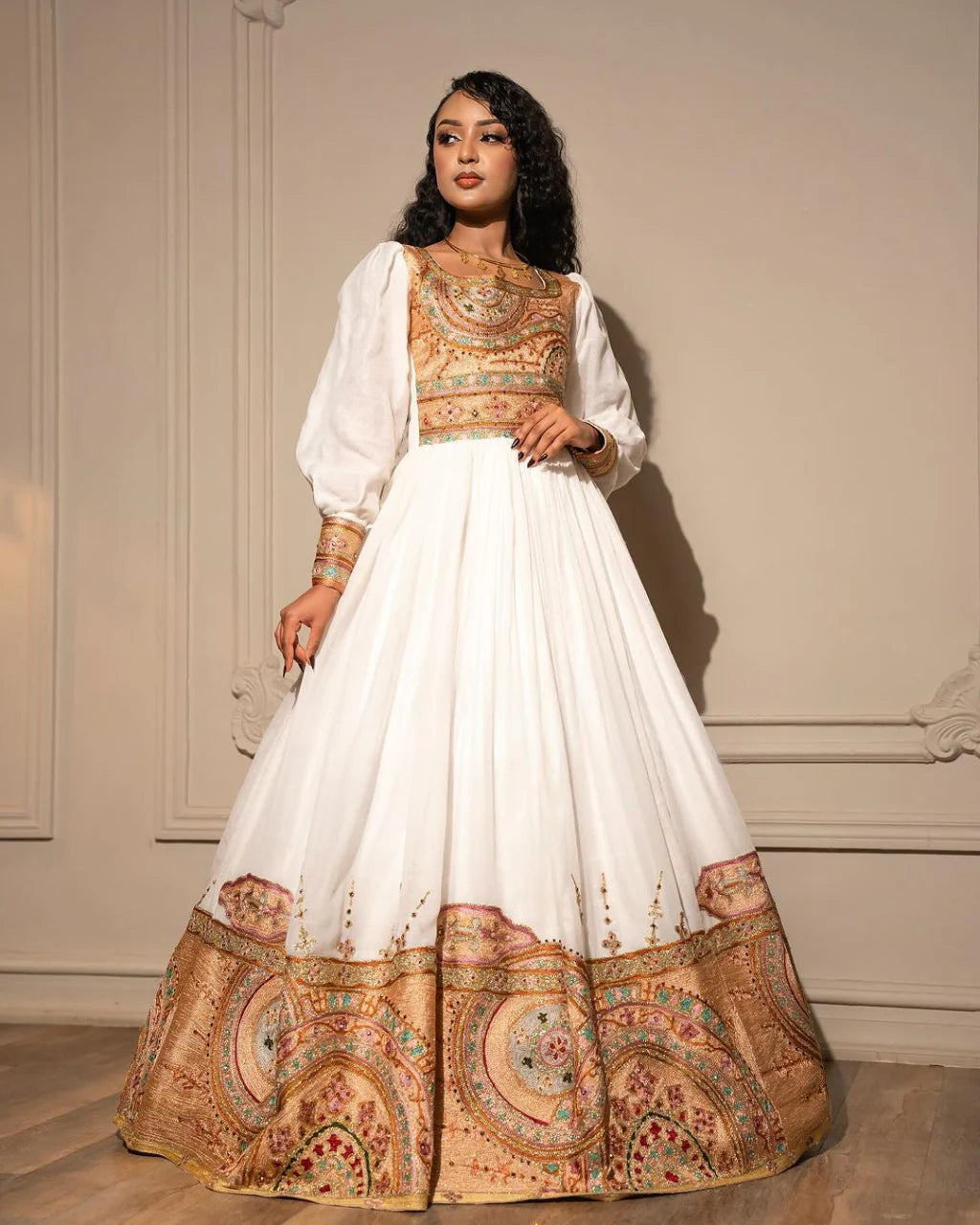 Elaborate Golden Embroidery on Habesha Attire Featuring Contemporary Designs