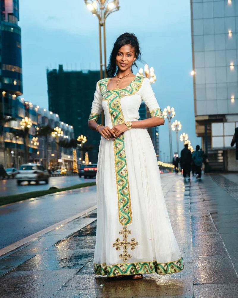 Charming Light Green Habesha Attire: Simple Yet Stunning Traditional Garment