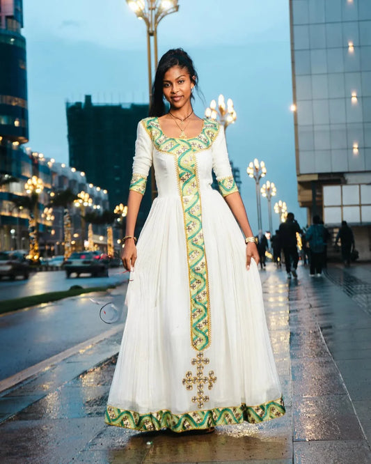 Charming Light Green Habesha Attire: Simple Yet Stunning Traditional Garment