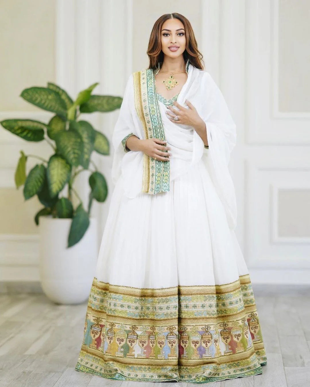 Handwoven wedding Habesha Kemis in stunning hues, showcasing the beauty of Habesha craftsmanship