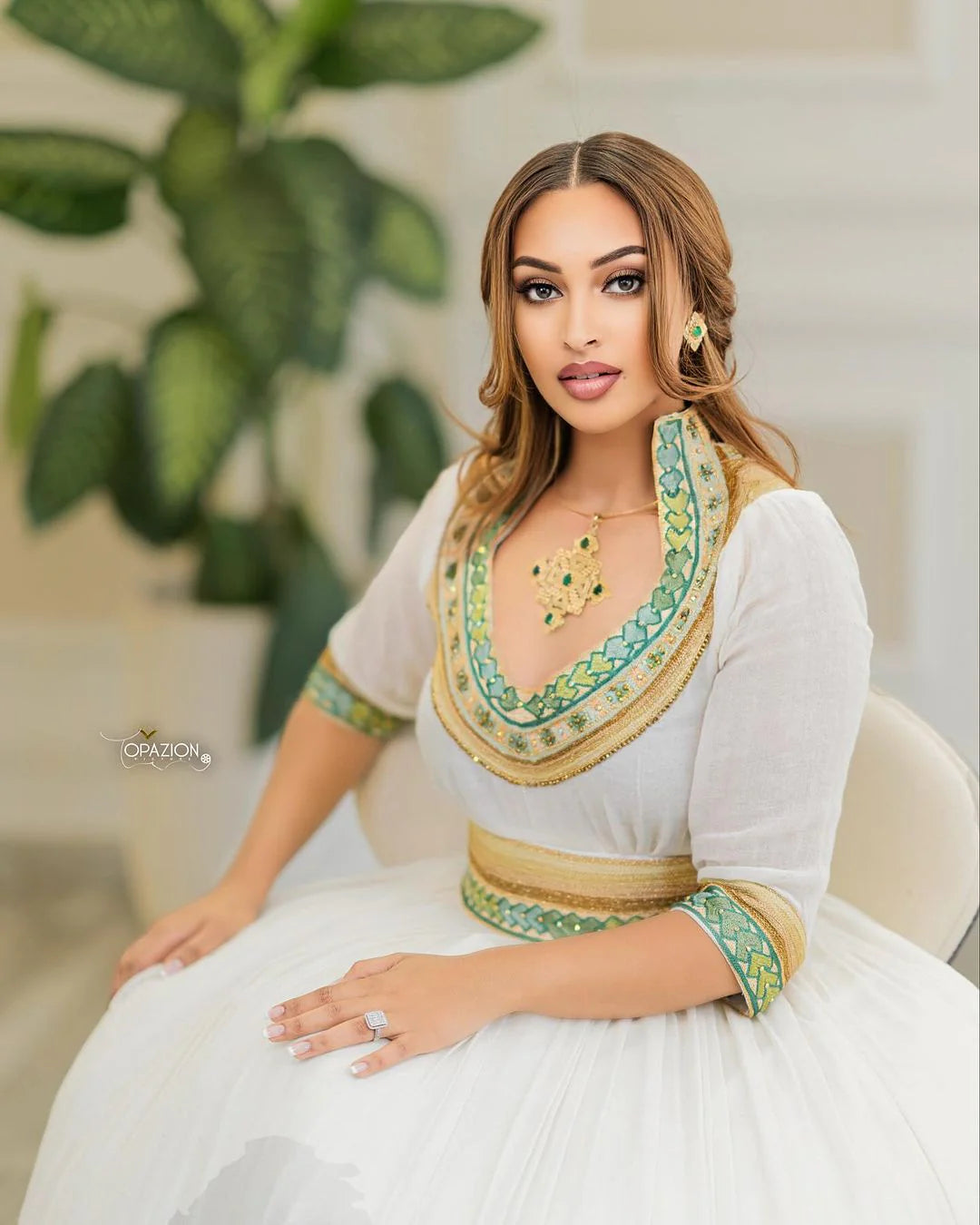 Handwoven wedding Habesha Kemis in stunning hues, showcasing the beauty of Habesha craftsmanship