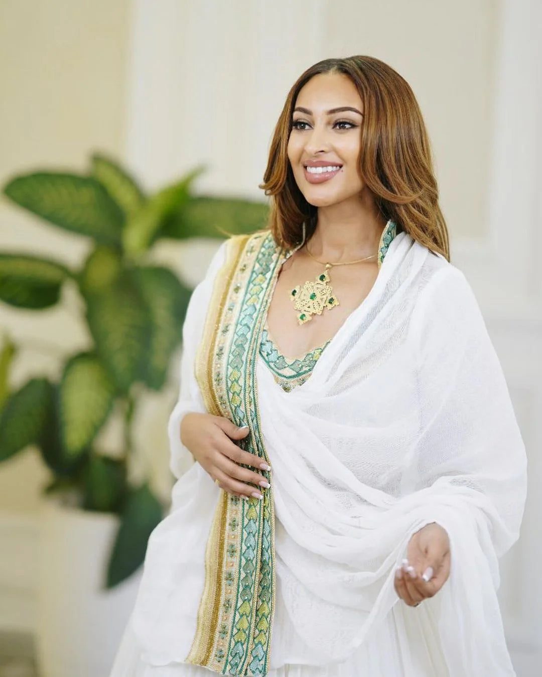 Handwoven wedding Habesha Kemis in stunning hues, showcasing the beauty of Habesha craftsmanship