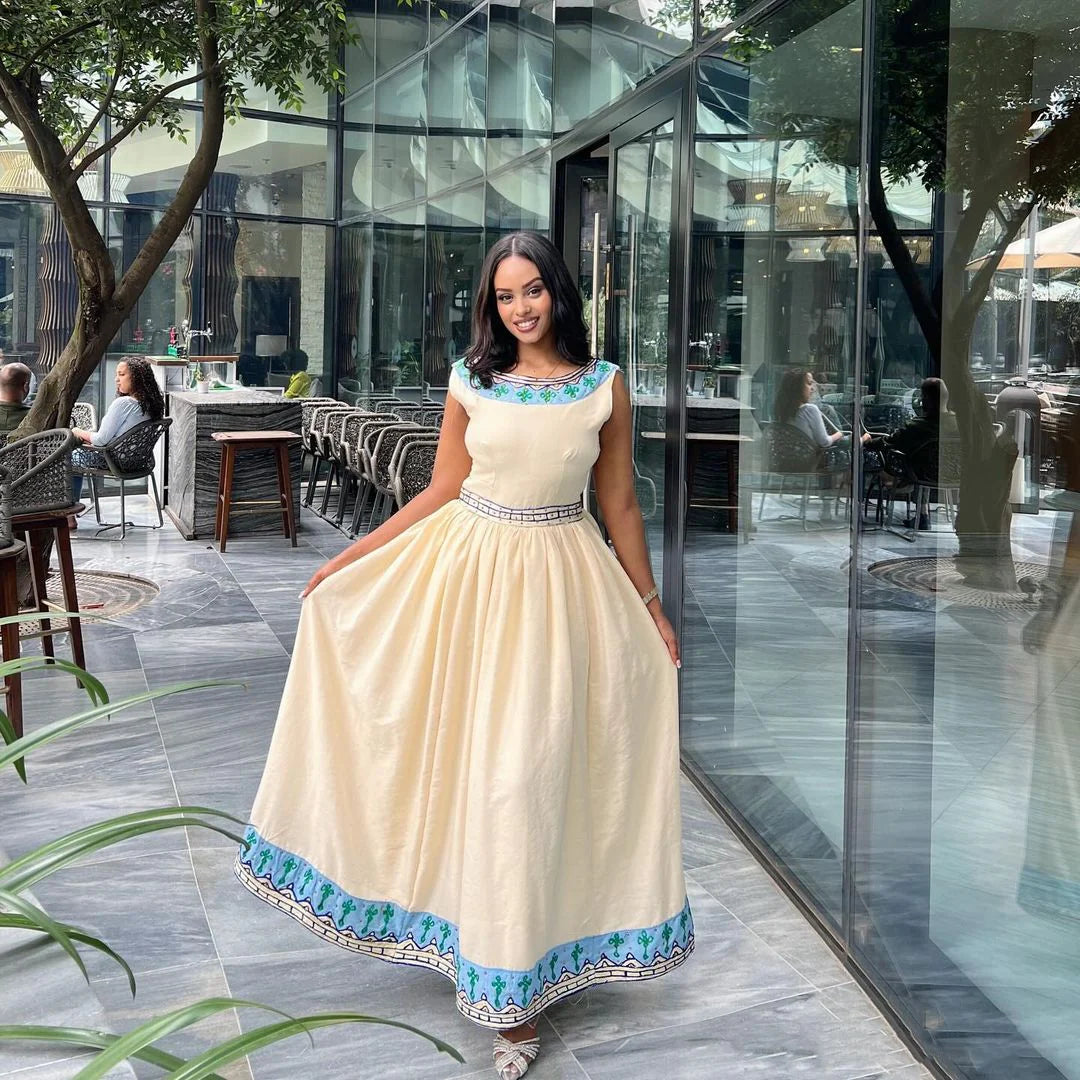 Contemporary Habesha Traditional Gown with Azure Patterns – Graceful Habesha Attire