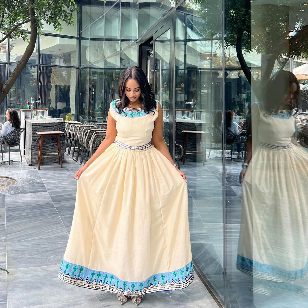 Contemporary Habesha Traditional Gown with Azure Patterns – Graceful Habesha Attire