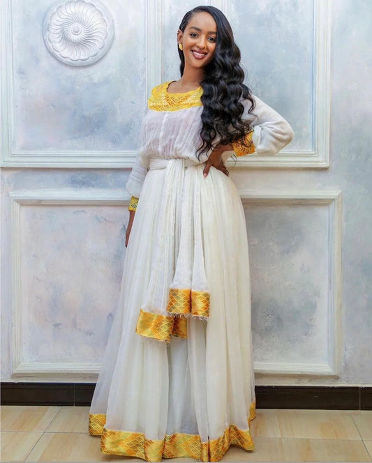 Stylish Yellow Modern Habesha Dress with a unique Habesha Kemis design