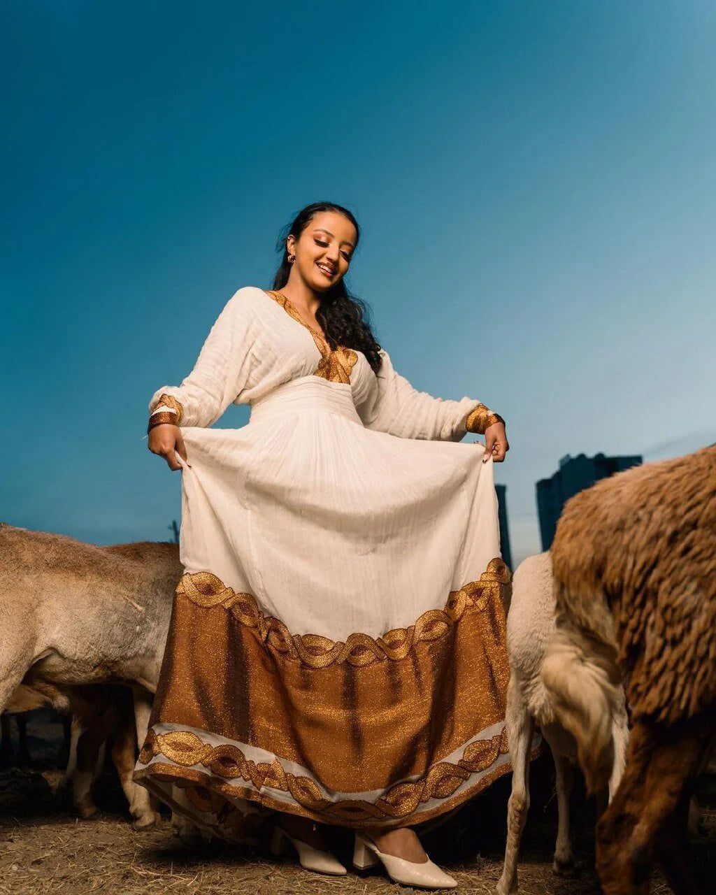 Golden Brown Shimena Elegance: A stunning Habesha dress in Menen fabric with a Tilf chain design