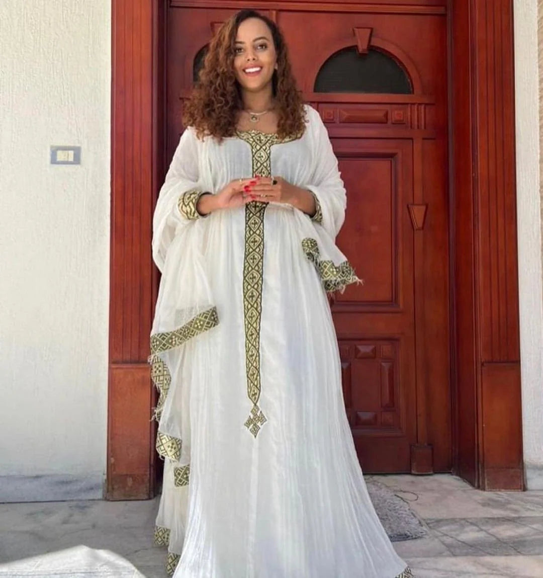 Simple Habesha Kemis and handwoven Habesha dress highlight the elegance of Habesha culture