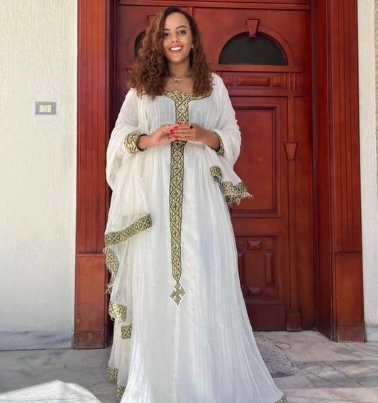 Simple Habesha Kemis and handwoven Habesha dress highlight the elegance of Habesha culture