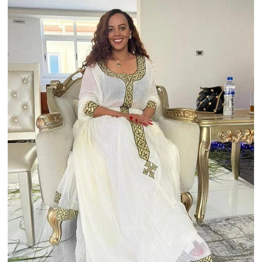 Simple Habesha Kemis and handwoven Habesha dress highlight the elegance of Habesha culture