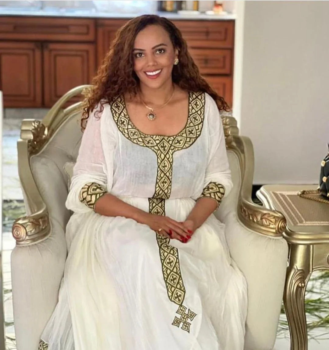 Simple Habesha Kemis and handwoven Habesha dress highlight the elegance of Habesha culture