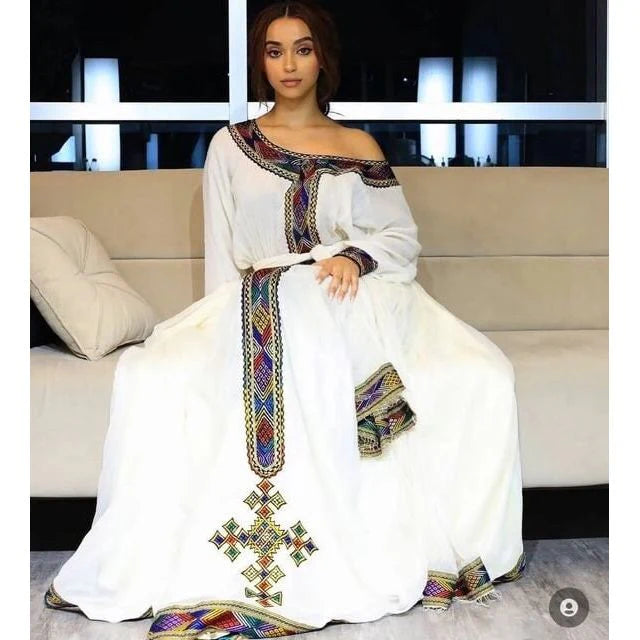 Chic Menen Kemis with subtle Tilf details and Shimena design, embodying Habesha elegance