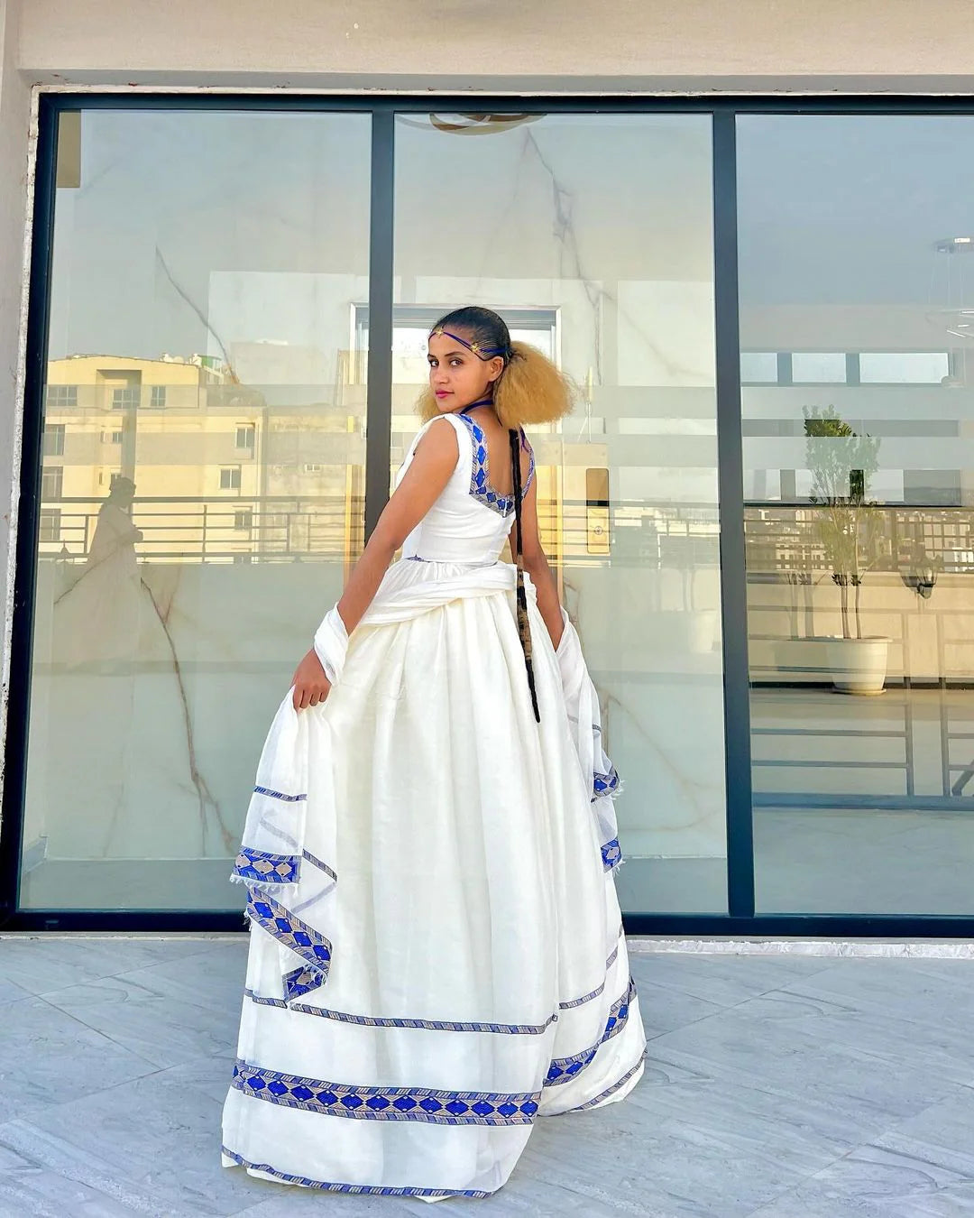Exude Sophistication in Our Stylish Habesha Gown Beautiful Azure Habesha Ensemble