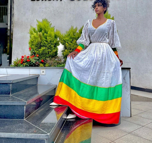 An iconic Habesha Kemis inspired by the flag, this design embodies cultural pride and modern style