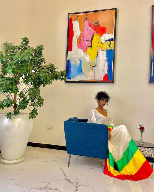 An iconic Habesha Kemis inspired by the flag, this design embodies cultural pride and modern style