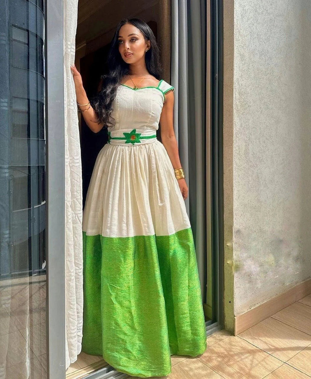 Chic green Habesha dress, featuring an elegant Habesha Kemis