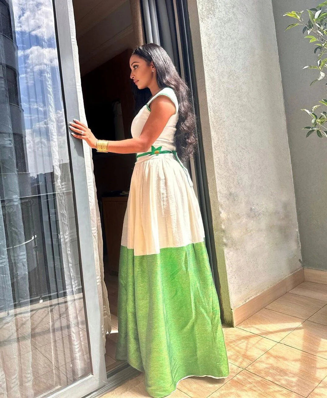Chic green Habesha dress, featuring an elegant Habesha Kemis