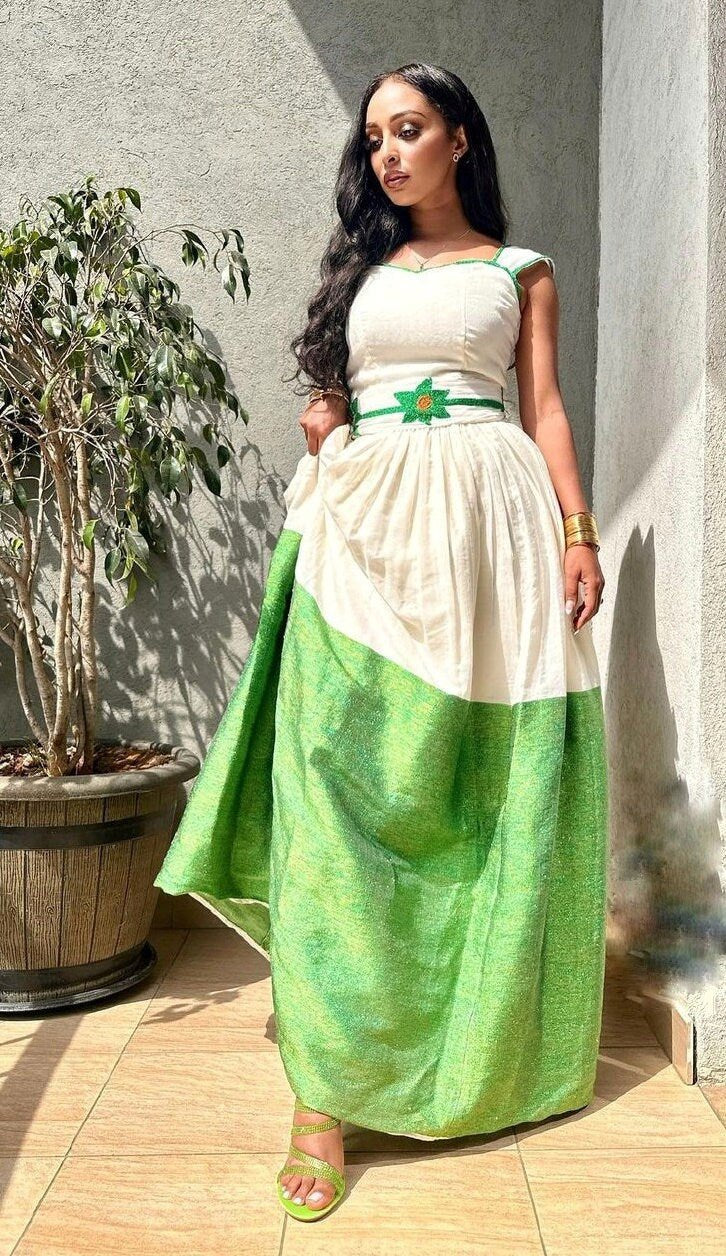 Chic green Habesha dress, featuring an elegant Habesha Kemis