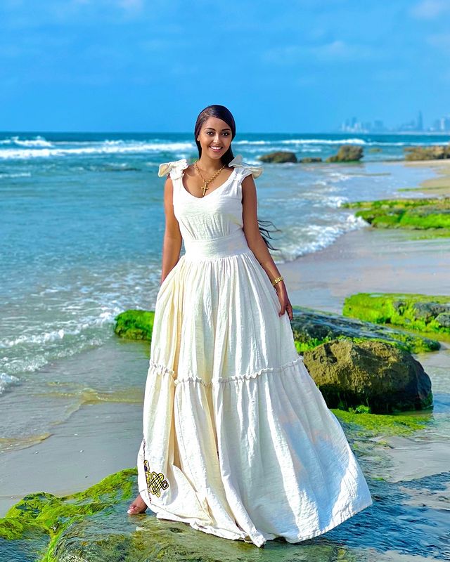 Modern Fusion Habesha Dress with a Cross Motif at the Hem Traditional Habesha Attire