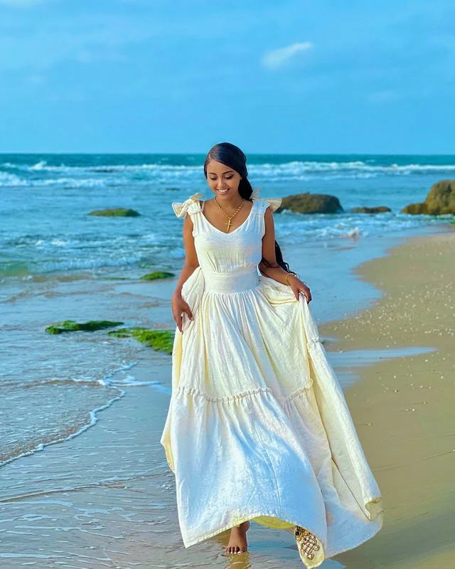 Modern Fusion Habesha Dress with a Cross Motif at the Hem Traditional Habesha Attire