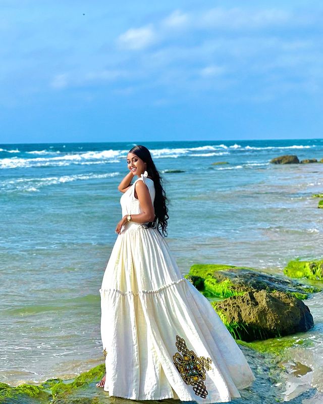 Modern Fusion Habesha Dress with a Cross Motif at the Hem Traditional Habesha Attire