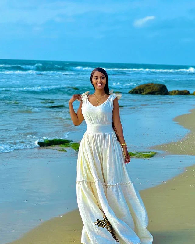 Modern Fusion Habesha Dress with a Cross Motif at the Hem Traditional Habesha Attire