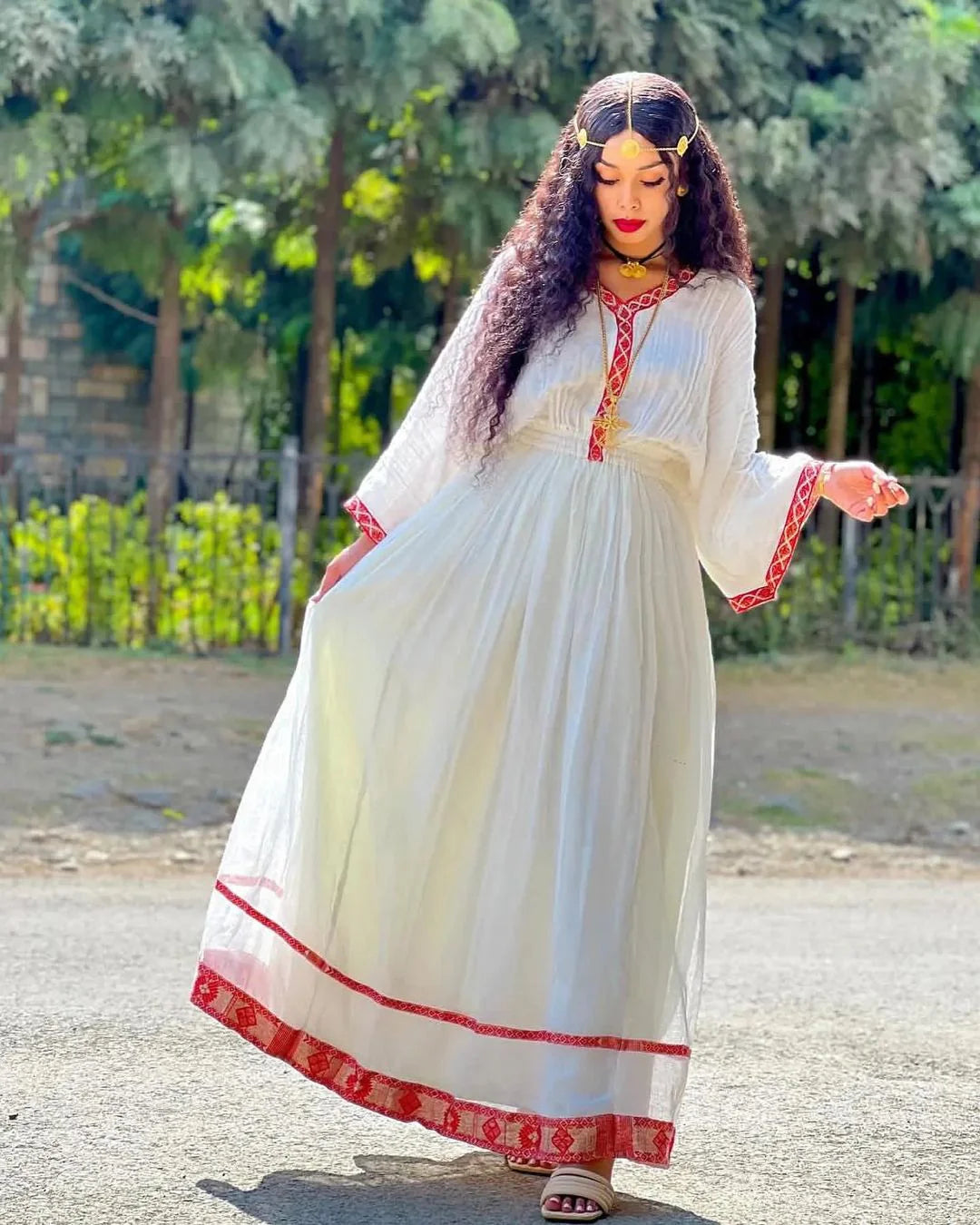 Simplicity in Scarlet Modern Habesha Dress Redefined with Enduring Grace
