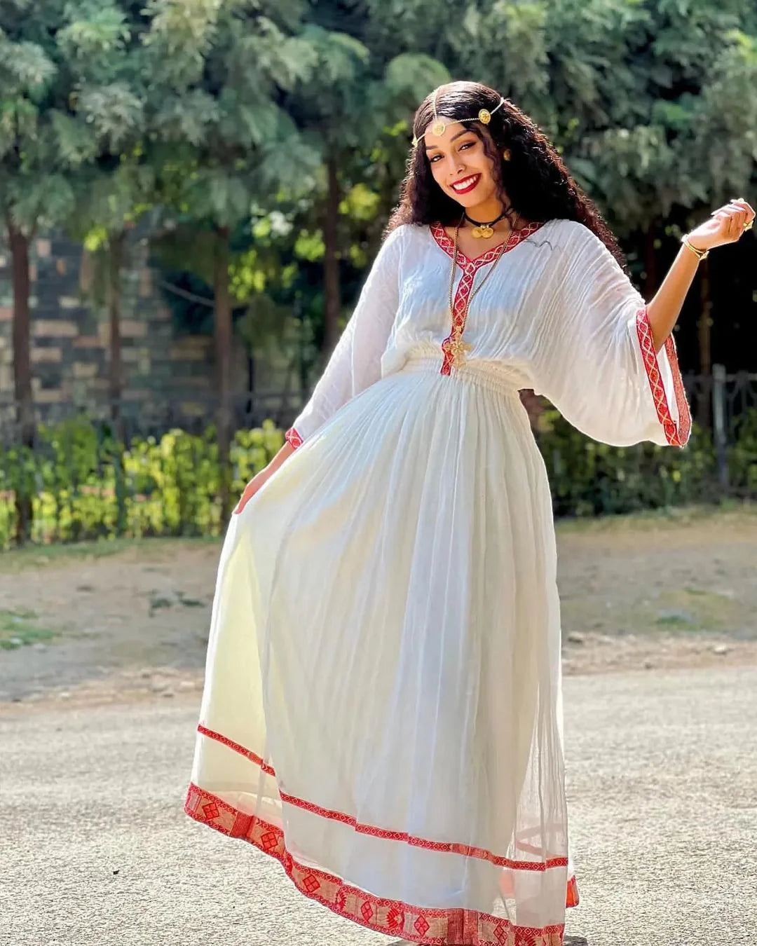 Simplicity in Scarlet Modern Habesha Dress Redefined with Enduring Grace