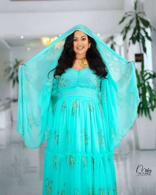 Elegance in Turquoise A Celebration of Habesha Chiffon Fashion