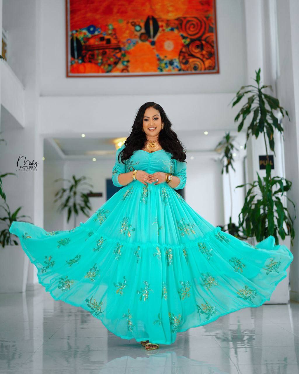 Elegance in Turquoise A Celebration of Habesha Chiffon Fashion