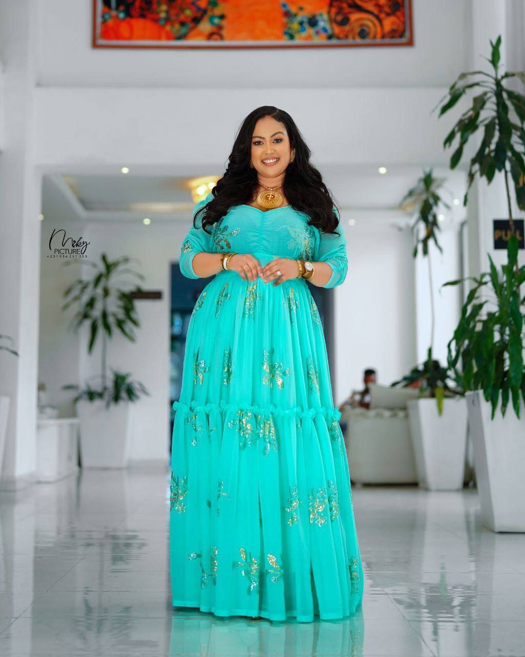 Elegance in Turquoise A Celebration of Habesha Chiffon Fashion