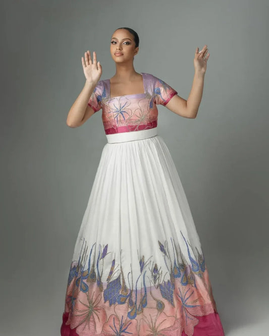 Elegant Unity A Contemporary Habesha Attire for Couples