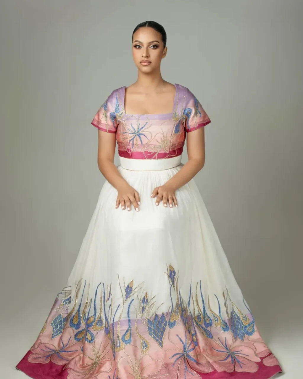 Elegant Unity A Contemporary Habesha Attire for Couples