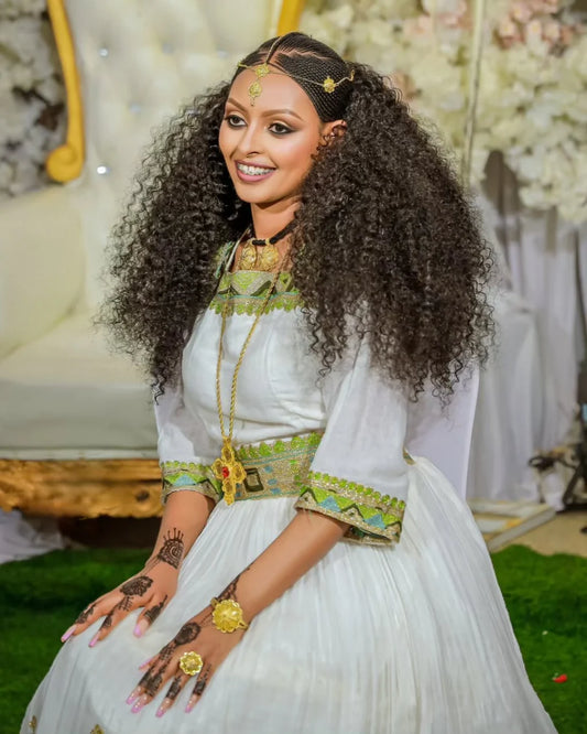 Timeless Tradition A Modern Habesha Couple's Attire