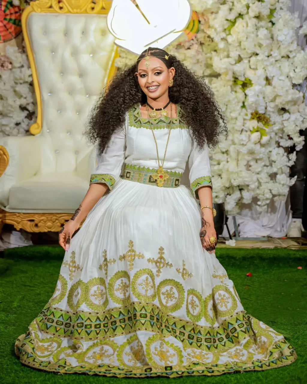 Timeless Tradition A Modern Habesha Couple's Attire