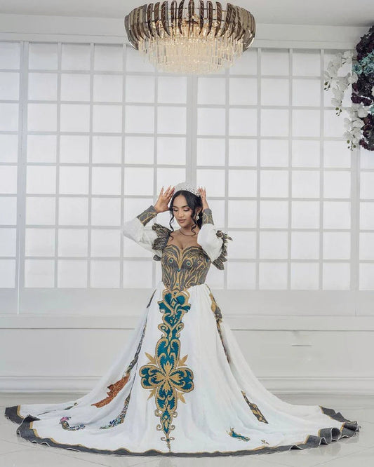 Exquisite Habesha Dress with Vibrant Embroidery and Dramatic Sleeves