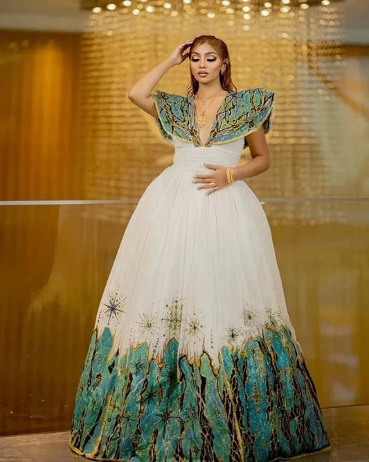 Beautiful Habesha Dress with Intricate Blue and Gold Embroidery