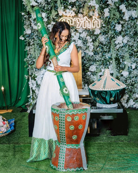 Stunning Habesha Dress with Vibrant Colors and Intricate Patterns