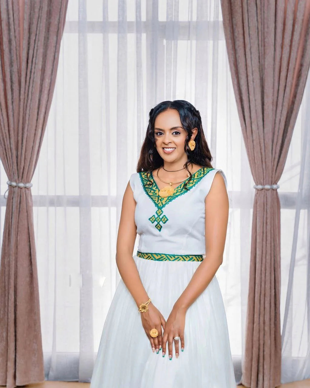 Stunning Habesha Dress with Vibrant Colors and Intricate Patterns