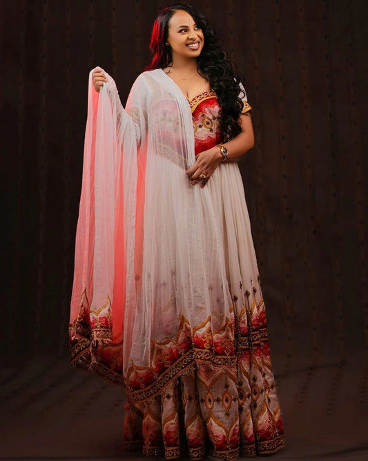 Stunning Habesha Dress with Vibrant Colors and Intricate Embroidery