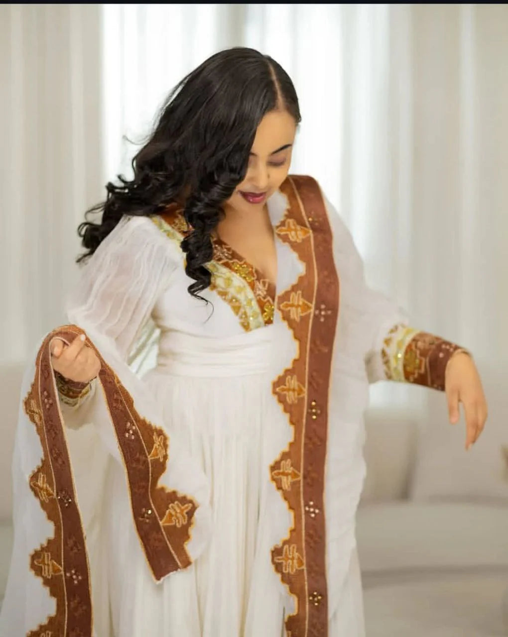 Exquisite Habesha Dress with Vibrant Colors and Intricate Embroidery