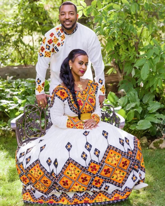 Elegance in Orange: Mesmerizing Habesha Wedding Attire.