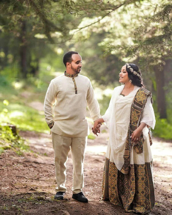 Artistry Unveiled: Handwoven Elegance in Habesha Couples' Outfit.