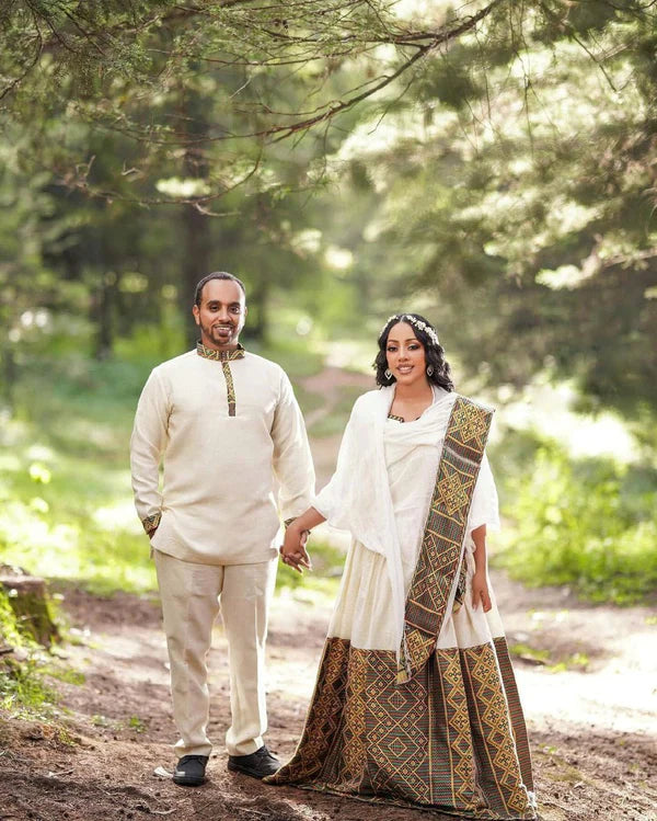 Artistry Unveiled: Handwoven Elegance in Habesha Couples' Outfit.