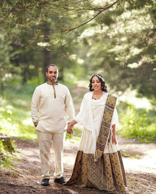 Artistry Unveiled: Handwoven Elegance in Habesha Couples' Outfit.