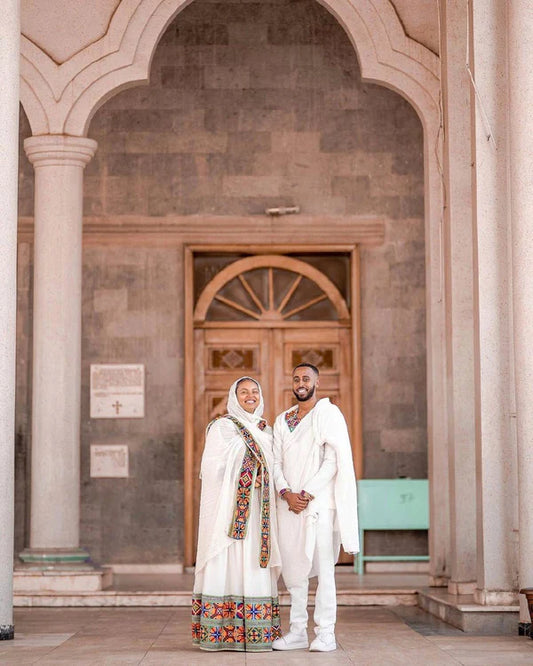 Modern Vibrant Habesha Couples Outfit: Simple Multi-Colored Attire.