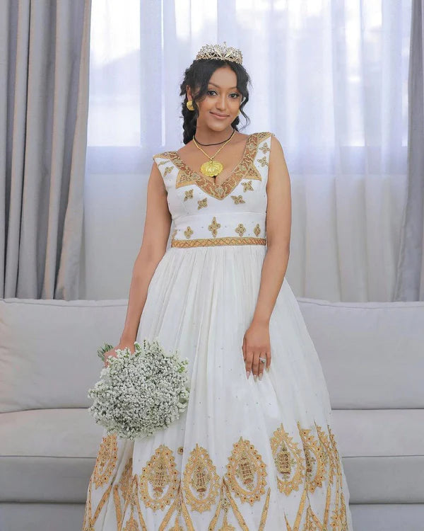 Habesha Elegance Unveiled: Stunning Wedding Attire for Couples.